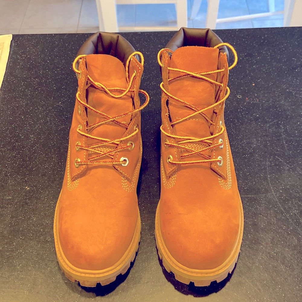 Size 5 M juniors Timberland boots. Tan in color